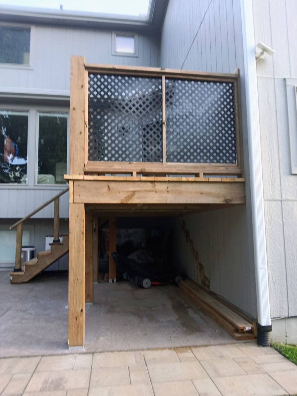 Completed deck lattice privacy railing viewed from the rear