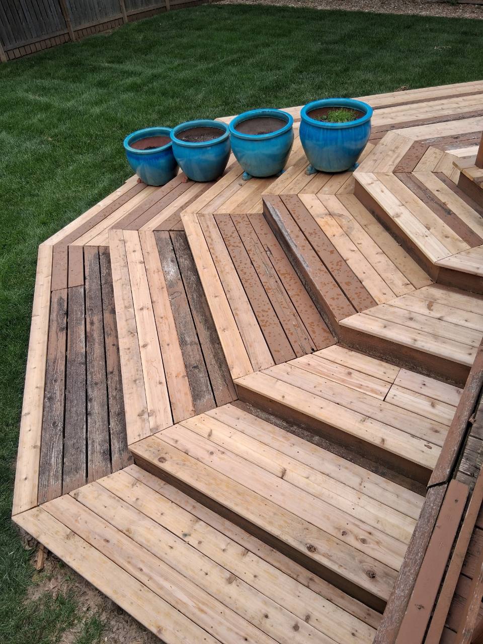 Large multi-level deck with replacement boards installed