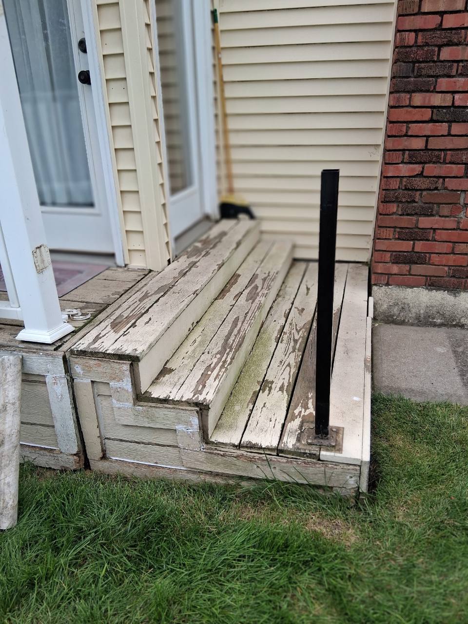 Weathered porch before repair